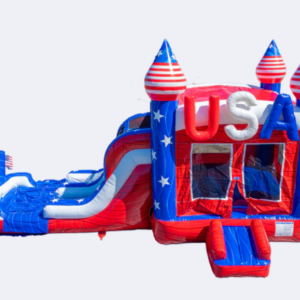 Alt Text: A commercial-grade, patriotic-themed USA dual lane inflatable bounce house combo with an attached curved water slide and splash landing, featuring red, white, and blue vinyl, stars, stripes, and large inflatable 'USA' letters.